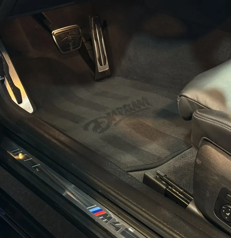 Detailed interior floor mats with Dream branding